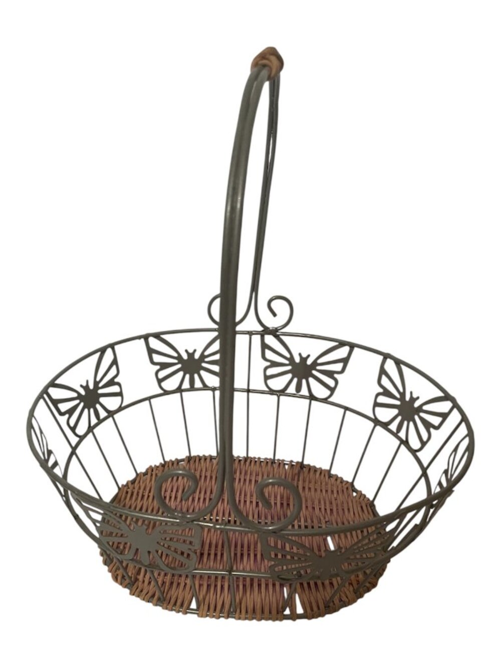 Oval wire basket with rattan base and butterfly accents along rim
